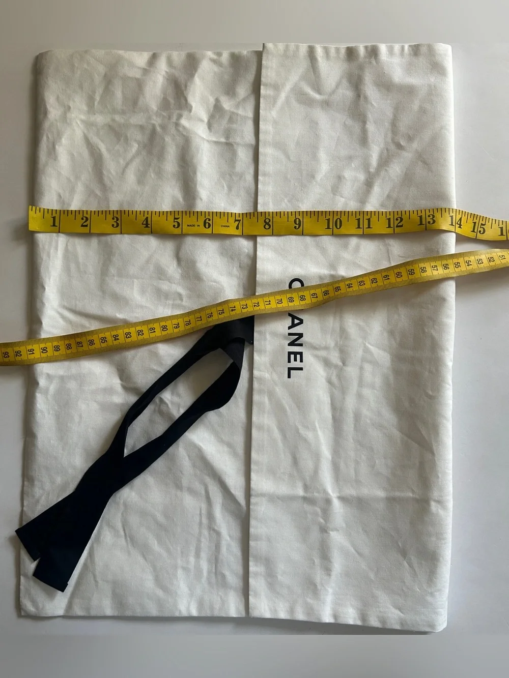 CHANEL White Dust Bag with Black Logo and Tie